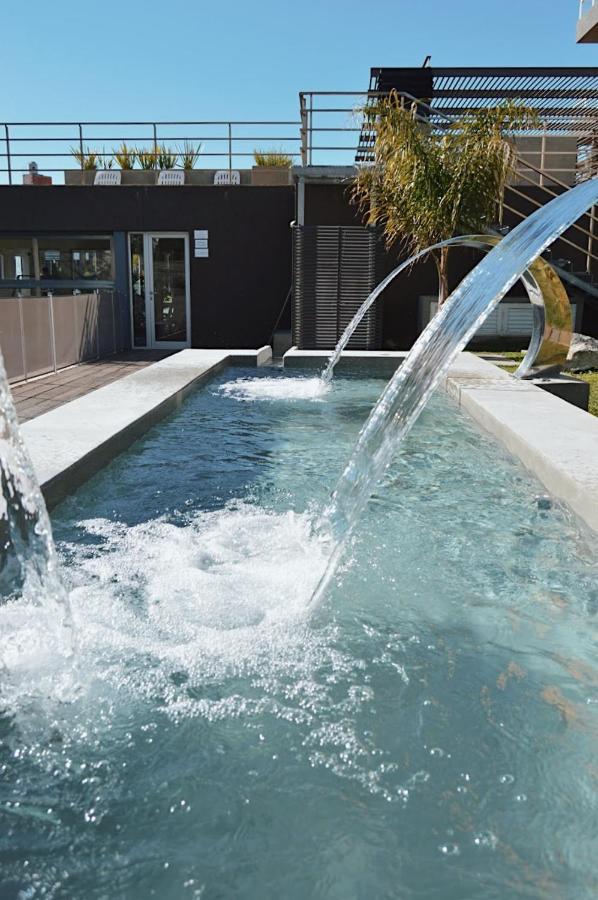 Aguas De Oro Aparthotel Villa Gesell Bagian luar foto