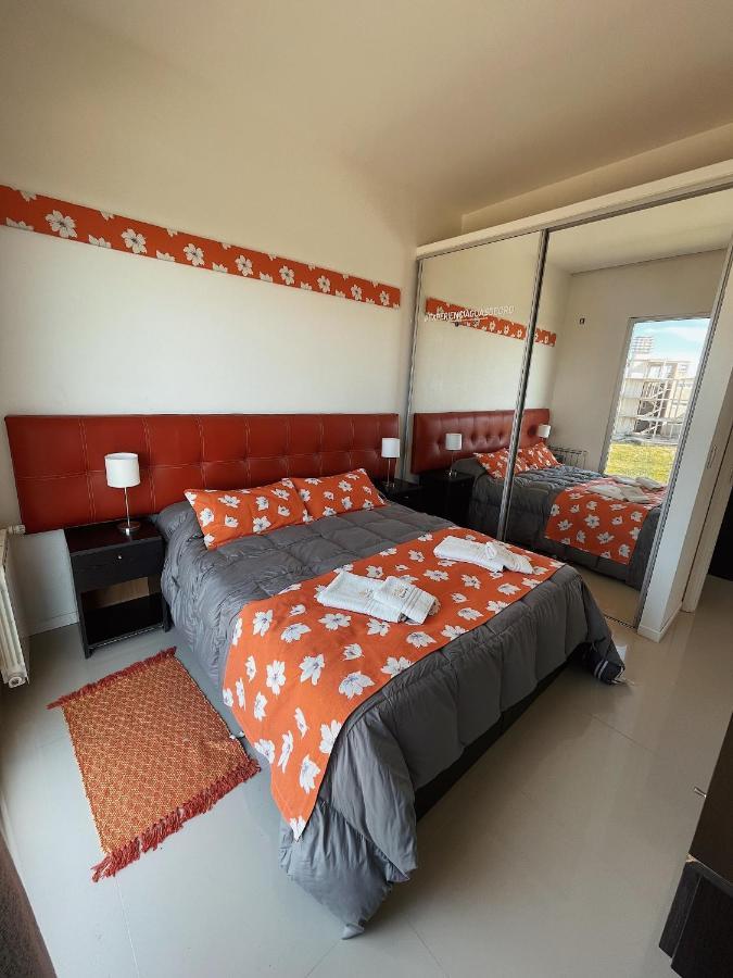Aguas De Oro Aparthotel Villa Gesell Bagian luar foto