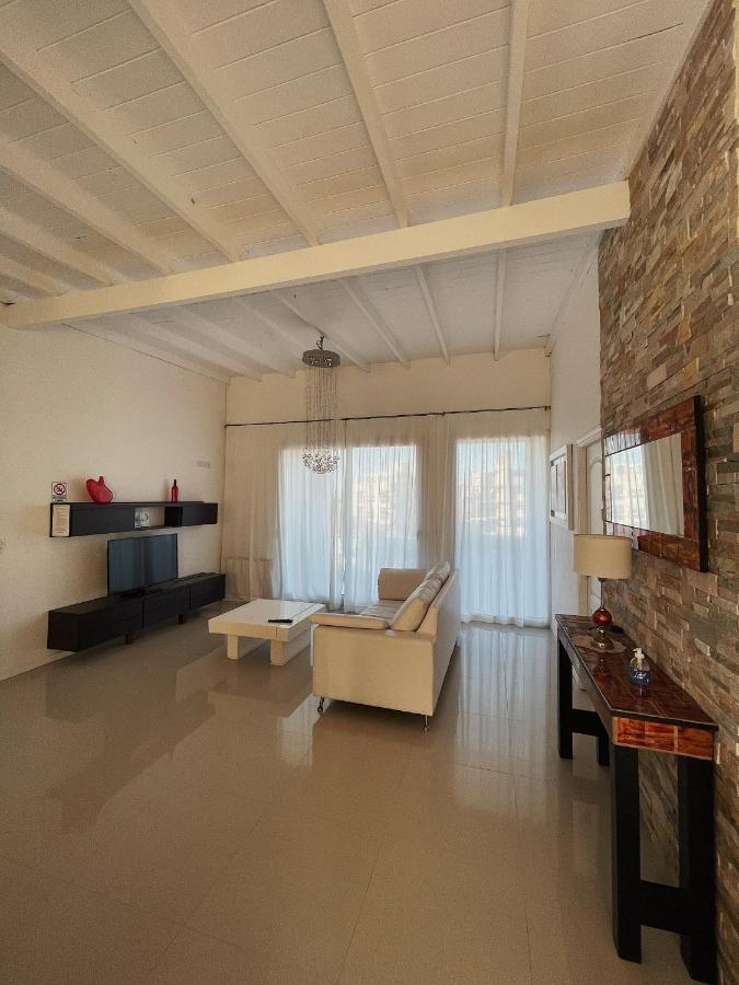 Aguas De Oro Aparthotel Villa Gesell Bagian luar foto