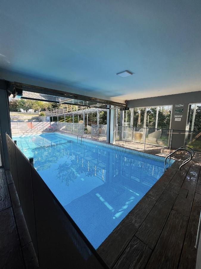 Aguas De Oro Aparthotel Villa Gesell Bagian luar foto