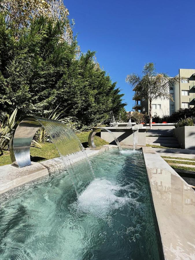 Aguas De Oro Aparthotel Villa Gesell Bagian luar foto